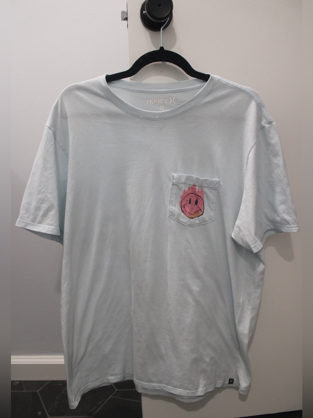 Hurley Light Blue Short Sleeve Tee with Pink Flame Smiley Pocket